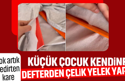 Yok artık dedirten kare: Küçük çocuk kendine defterden çelik yelek yaptı!